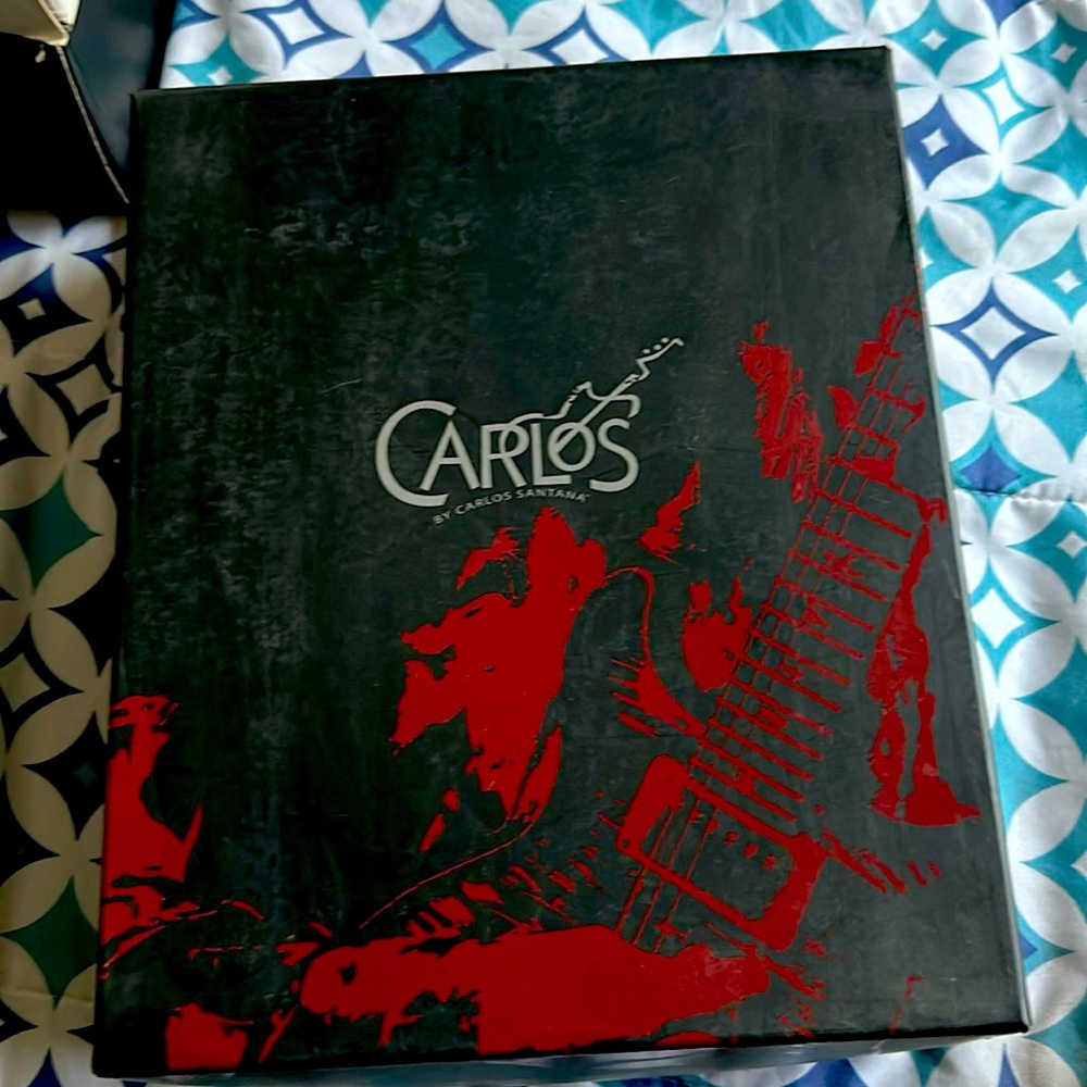 Carlos Santana high heels